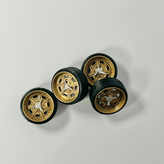 Golden "Rally" Style Steely Wheels with Chrome Knockoffs.