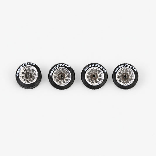 Four chrome Rucci-style multi-spoke miniature wheels with black lettered tires