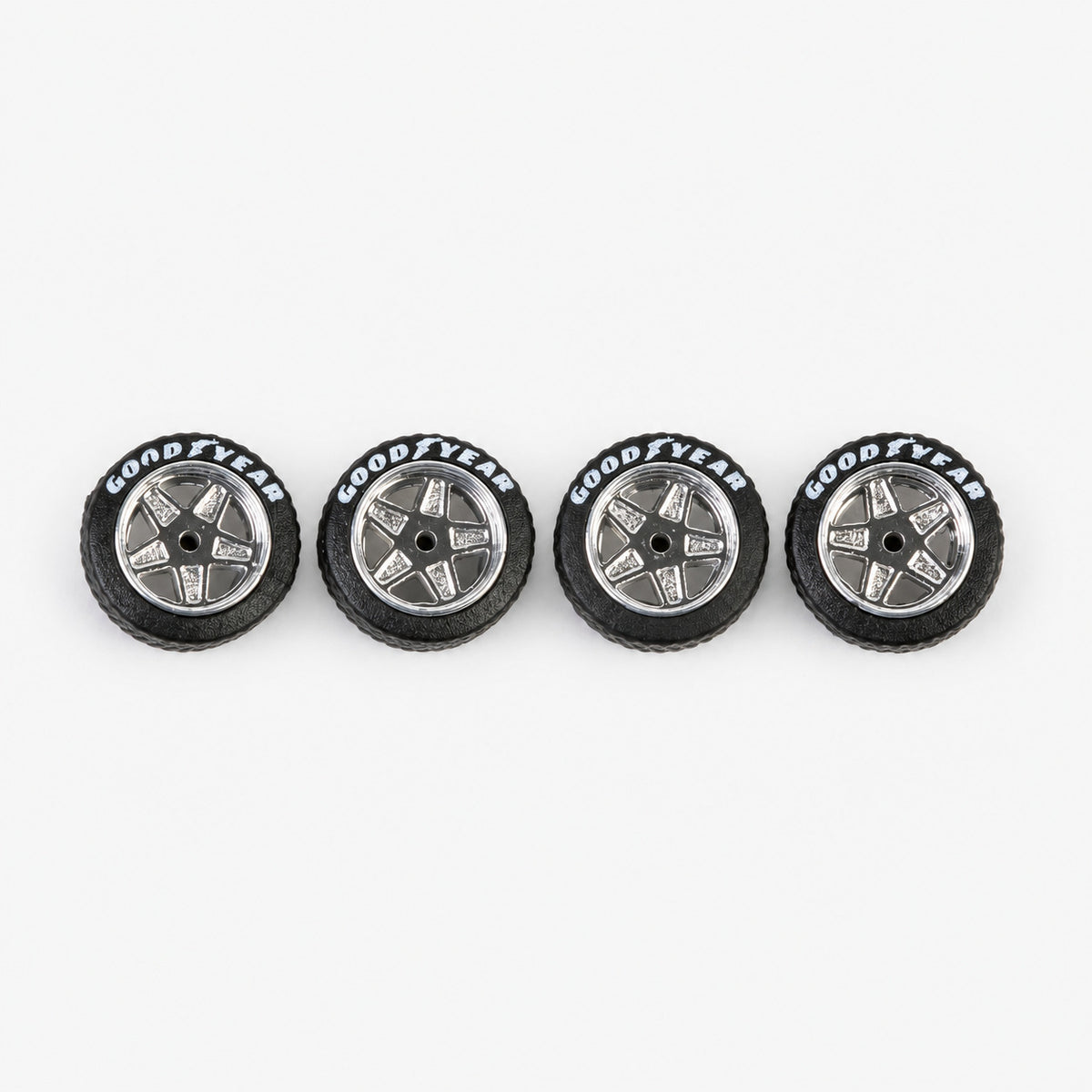 Four chrome five-spoke Ferrari-style miniature wheels with black lettered tires