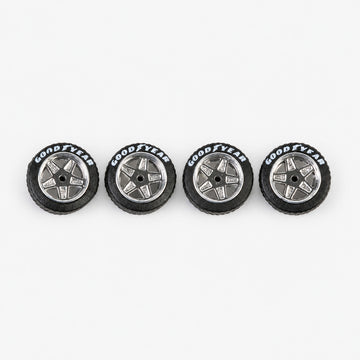 Four chrome five-spoke Ferrari-style miniature wheels with black lettered tires